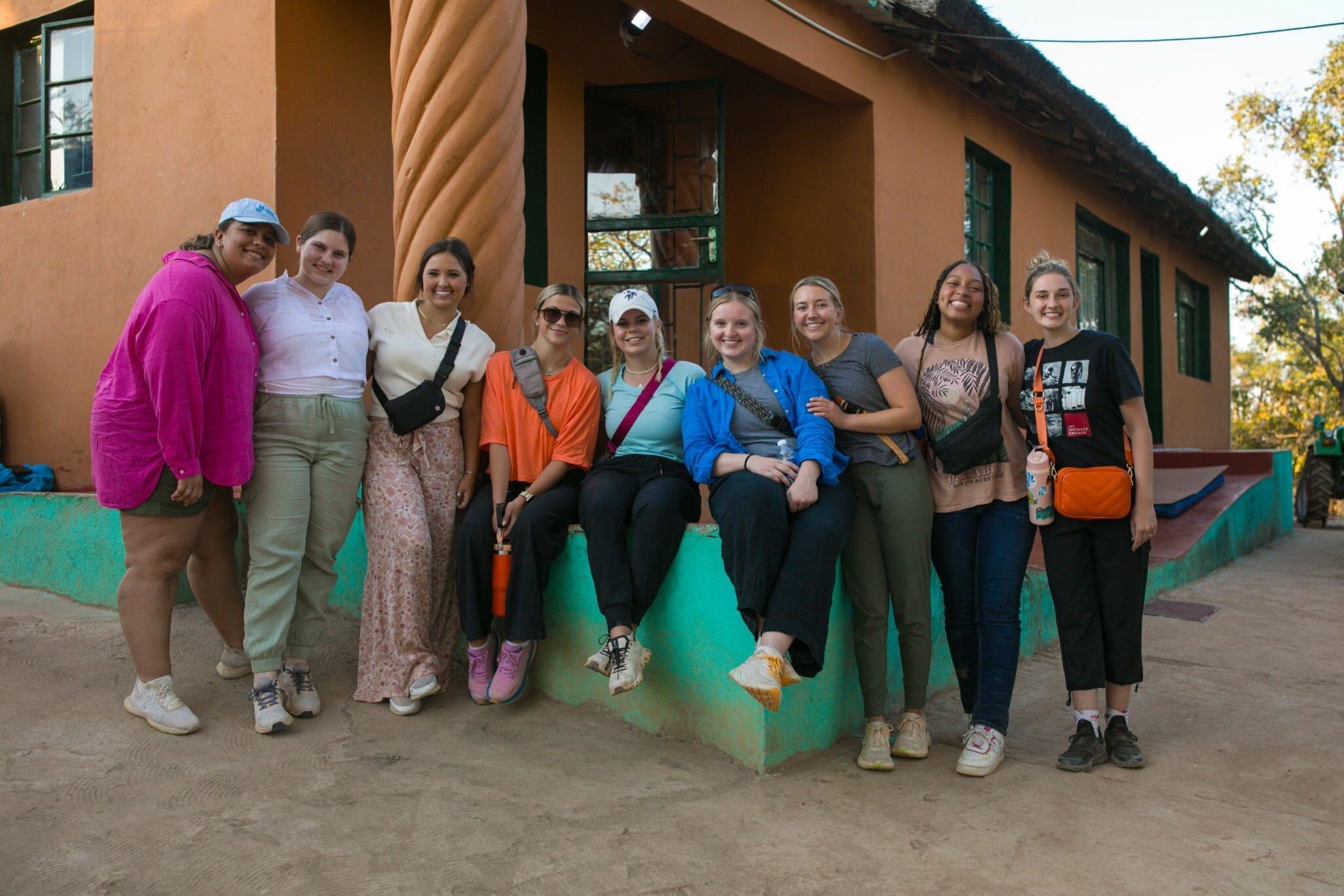 Students pose for a photo during their study abroad trip.