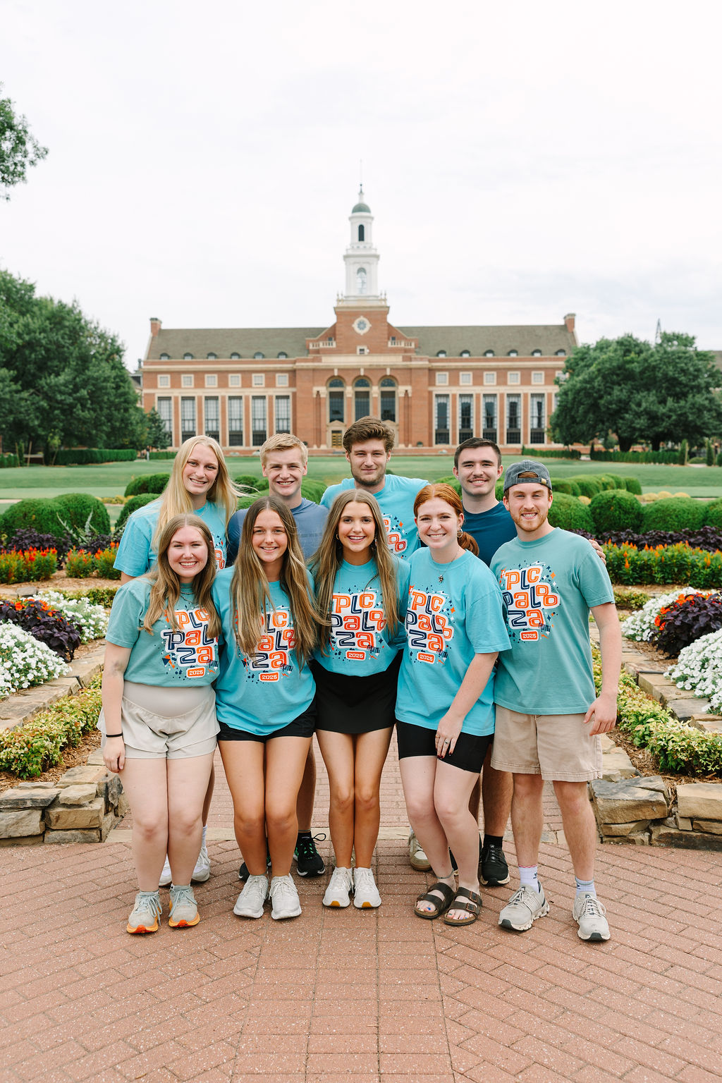 PLC student poses in a field